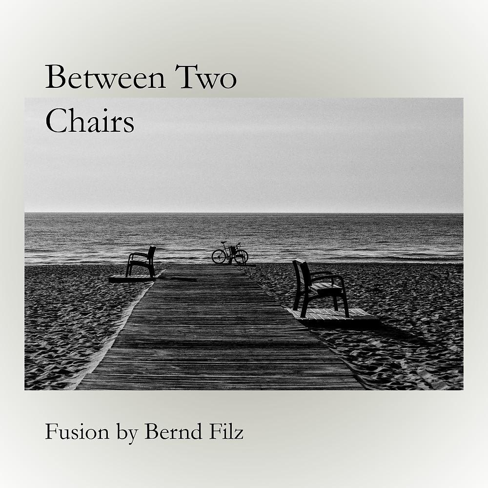 Постер альбома Between Two Chairs